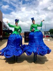 Blue Belles - Flower Stilt Walkers - Walkabout Entertainers
