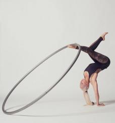 Tensile Twitch - Female Acrobatic Cyr Wheel Cabaret Act circus Entertainer