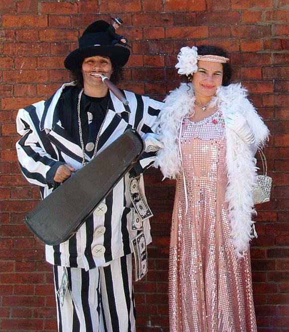 Rum BaBa's Fats and Toots - 1930's gangster and moll stilt walkers - walkabout